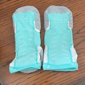 5 pairs of running socks. 4 Experia Thorlo, 1 Feetures.